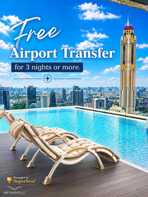 a sign that reads free airport transfer for nights or more at 1BR l 10 Mins from Siam Paragon l Rooftop Pool in Bangkok
