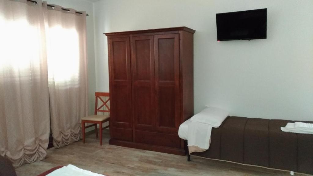 Agriturismo Grisciano - Habitación Cuádruple Confort