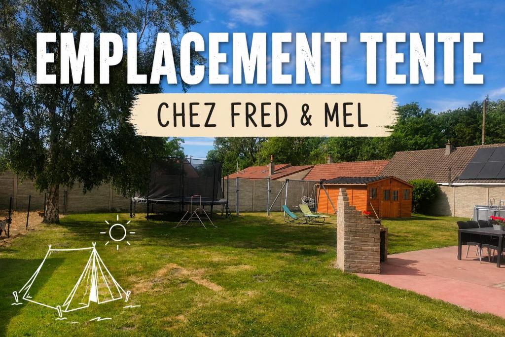 a view of a yard with a sign that says apartment centre cheez fired at Emplacement de tente in Hardinghen