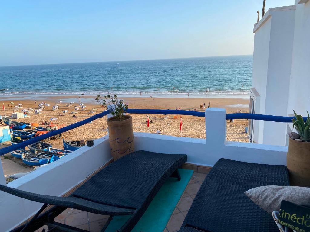 a balcony with a view of the beach at Soft Sand Beach in Taghazout