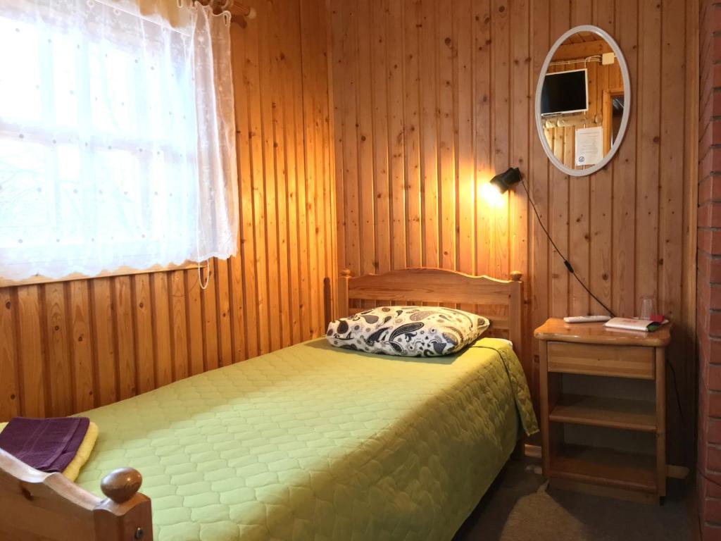 Postel nebo postele na pokoji v ubytování Anette's Holiday House