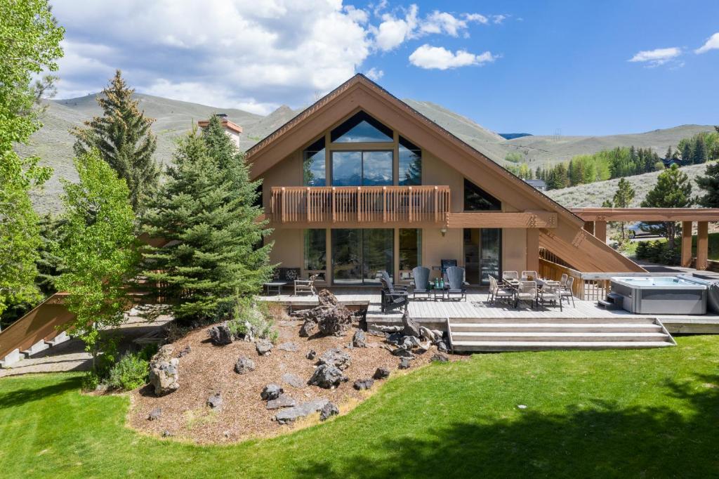 a house with a landscaping in front of it at Mountain Mid Century in Sun Valley