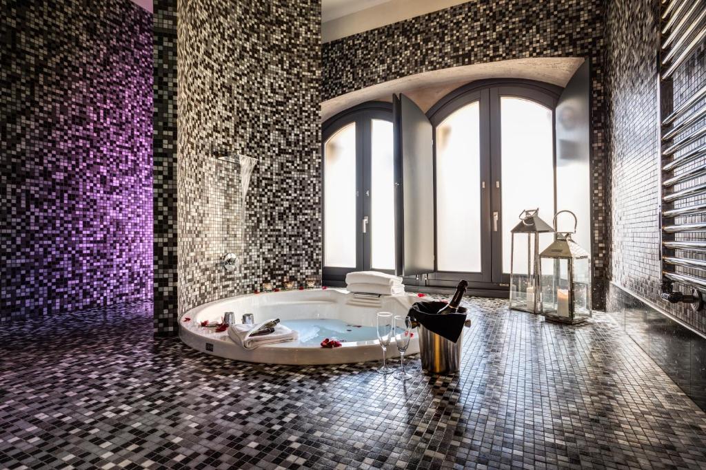 A bathroom at Dharma Luxury Hotel