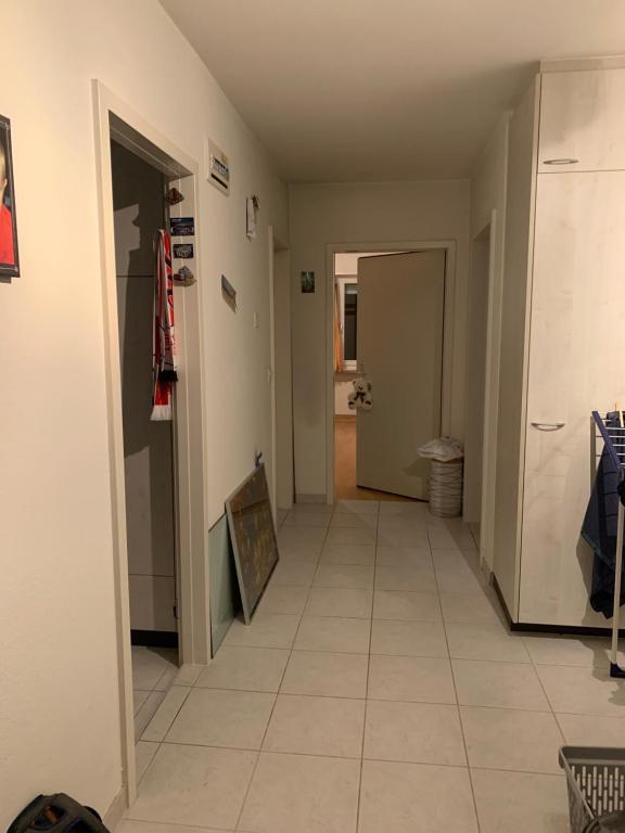 an empty hallway with a hallway leading to a room at Winterthur in Winterthur