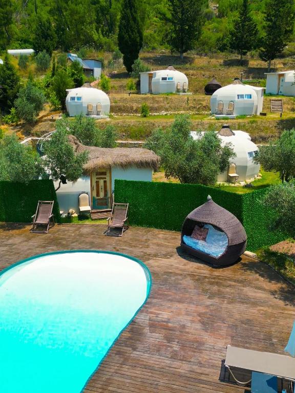 an aerial view of a backyard with a swimming pool at Vita Nova Hotel in Olympos