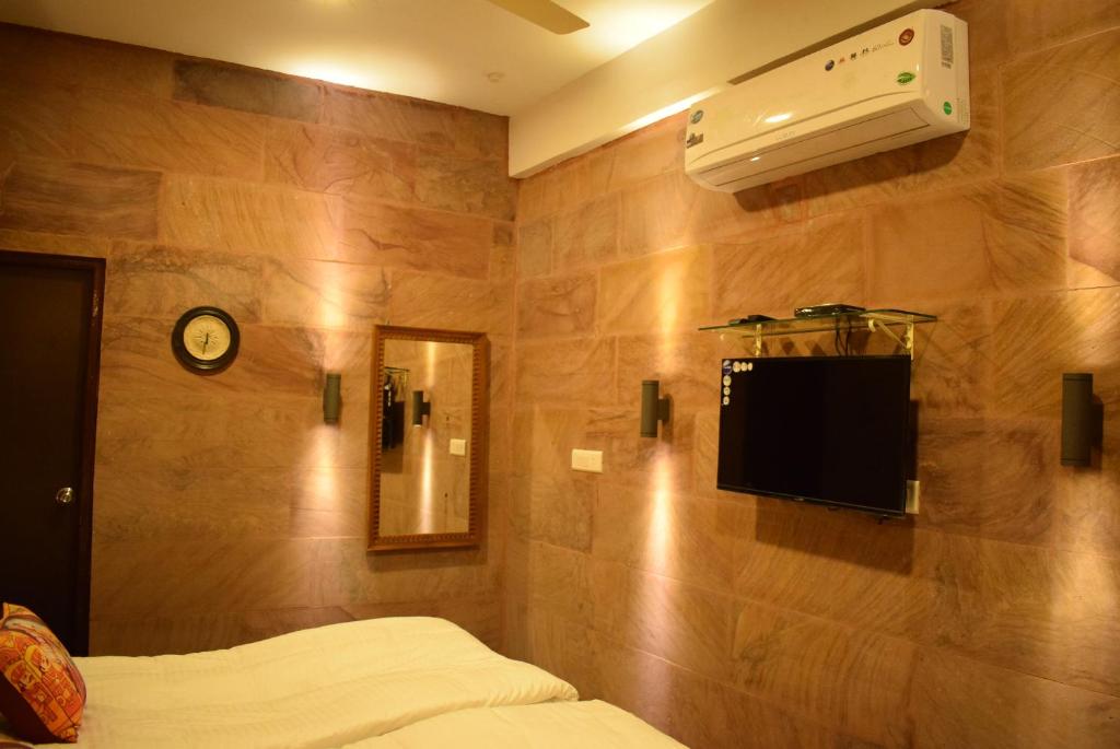TV o dispositivi per l'intrattenimento presso Suraj Haveli