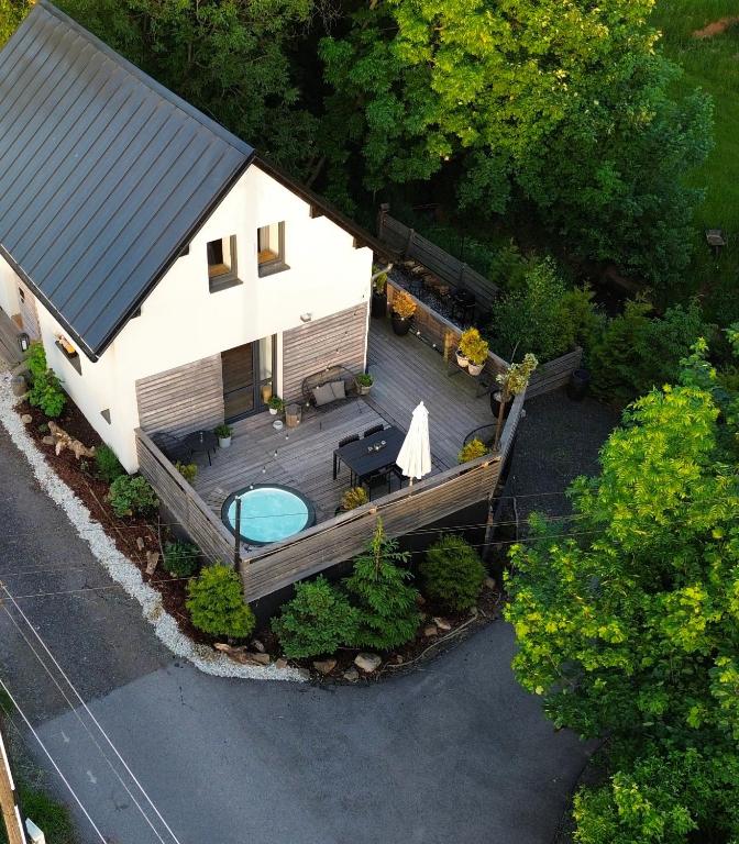 an aerial view of a house with a swimming pool at Chata Fraluq in Tatobity