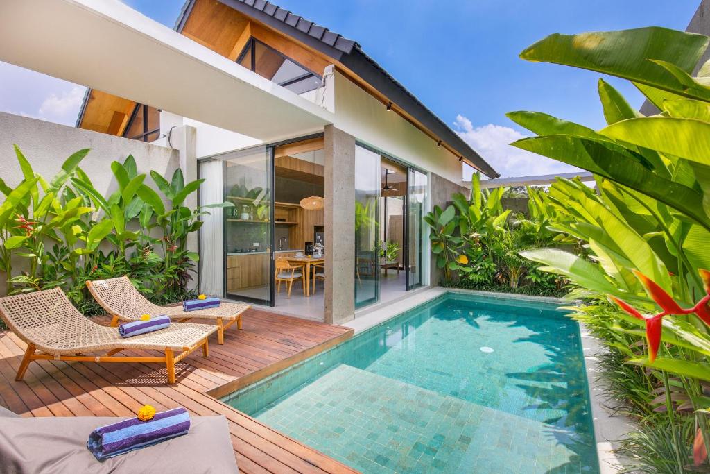 an image of a villa with a swimming pool at Ellavie Villa Ubud in Ubud