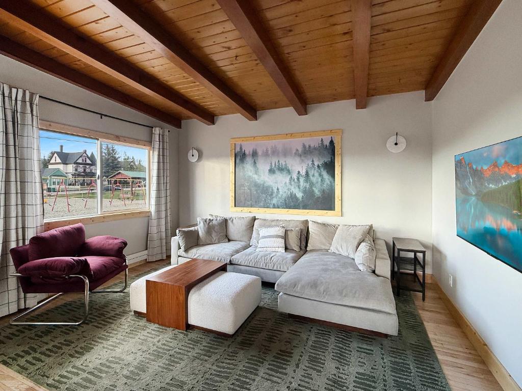 a living room with a couch and two chairs at 1 Block from Main St Views Pets Okay in Leadville