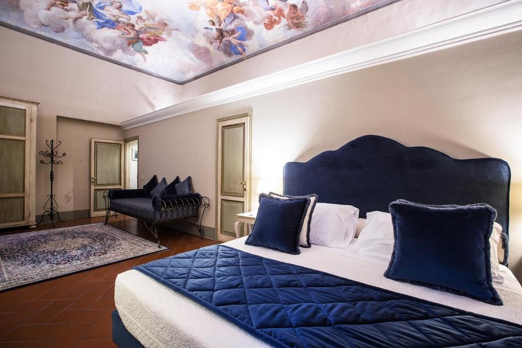 Posteľ alebo postele v izbe v ubytovaní Hotel Burchianti