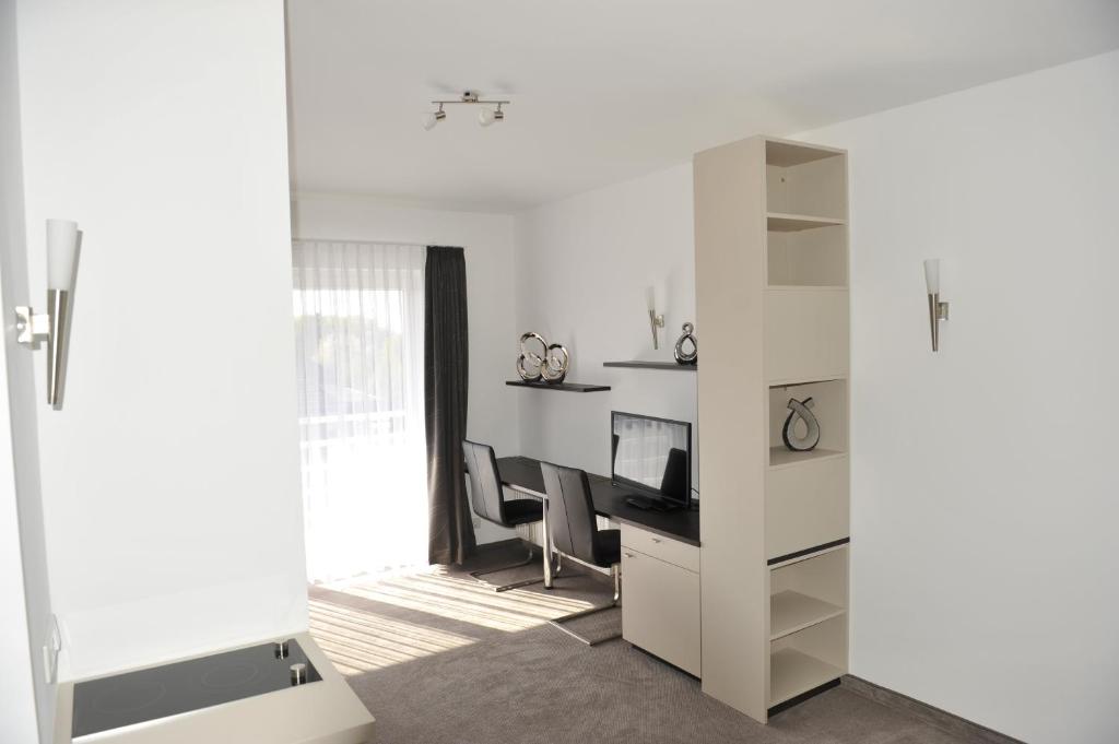 Kuchyň nebo kuchyňský kout v ubytování Hotel Alt Riemsloh