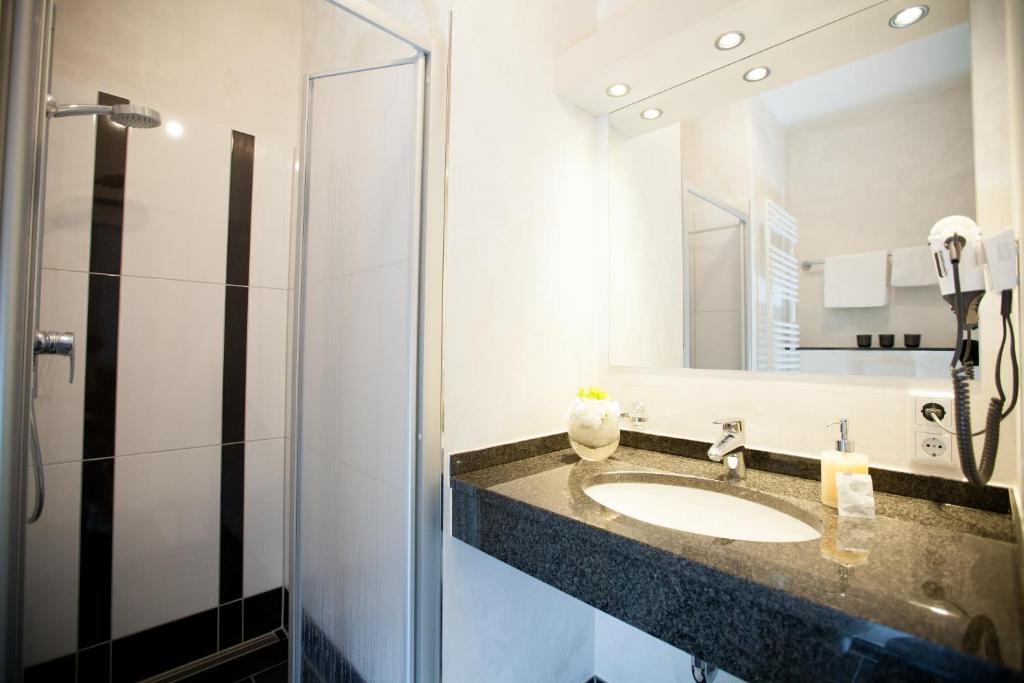 Koupelna v ubytování Hotel Alt Riemsloh