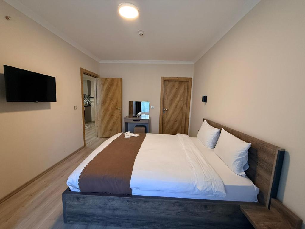 Rena Grand Residence & Suit - Chambre Familiale