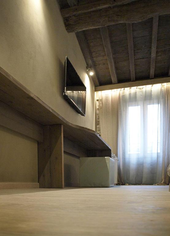 TV a/nebo společenská místnost v ubytování Stellio Affittacamere - Guest House