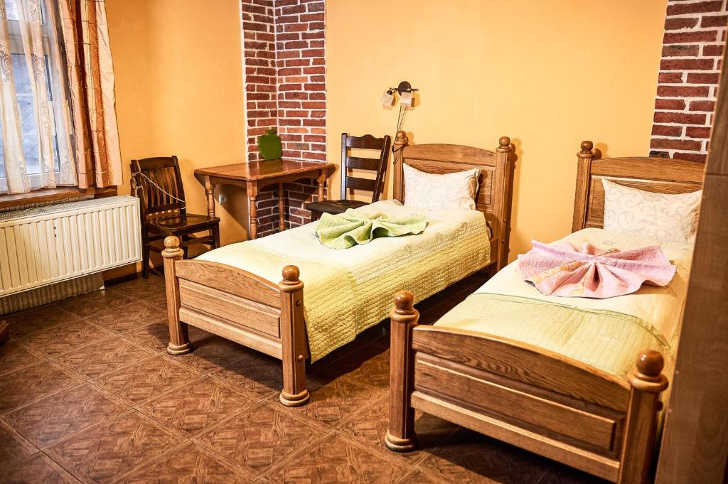 Postel nebo postele na pokoji v ubytování SAMARIANKA hotel
