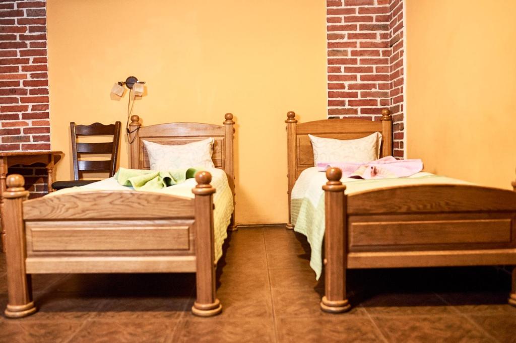 Postel nebo postele na pokoji v ubytování SAMARIANKA hotel