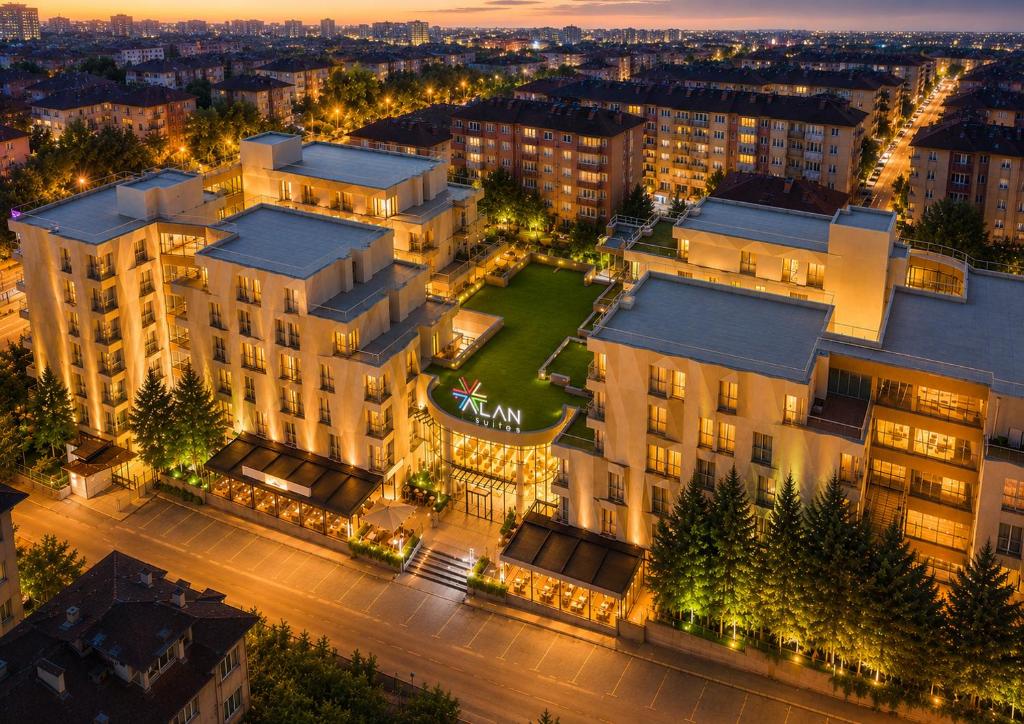 an aerial view of a building with a green lawn at Alan Suites in Edirne