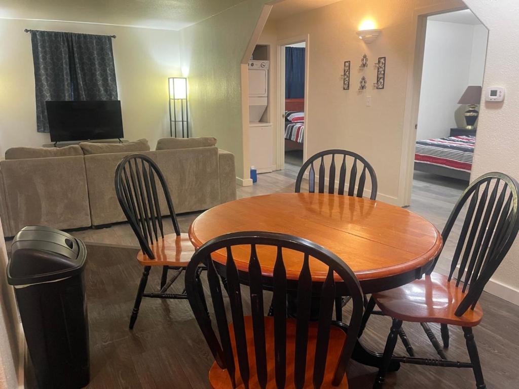 a living room with a table and chairs and a couch at Cozy Anchorage retreat in Anchorage