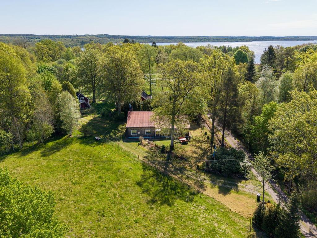 an aerial view of a house in a field at Holiday Home Extorp by Interhome in Hamneda