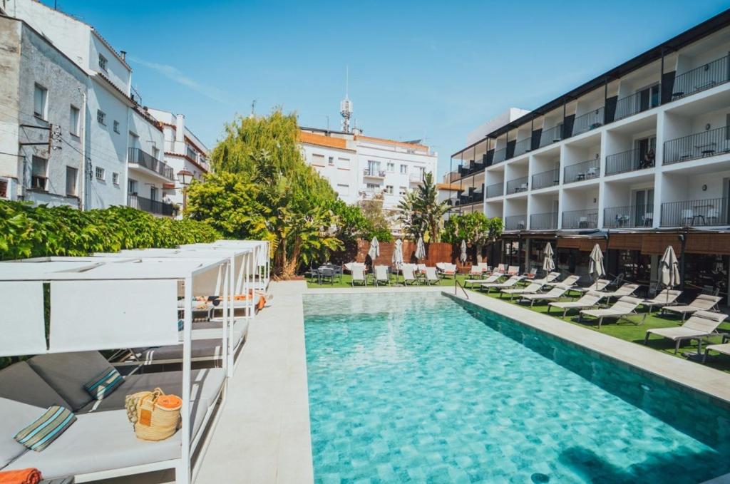 an image of a swimming pool at a hotel at Hotel Windsor Tossa - Adults Only 16 in Tossa de Mar