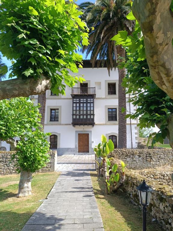 a view of the building from the garden at El Rincon de Belen in Noriega