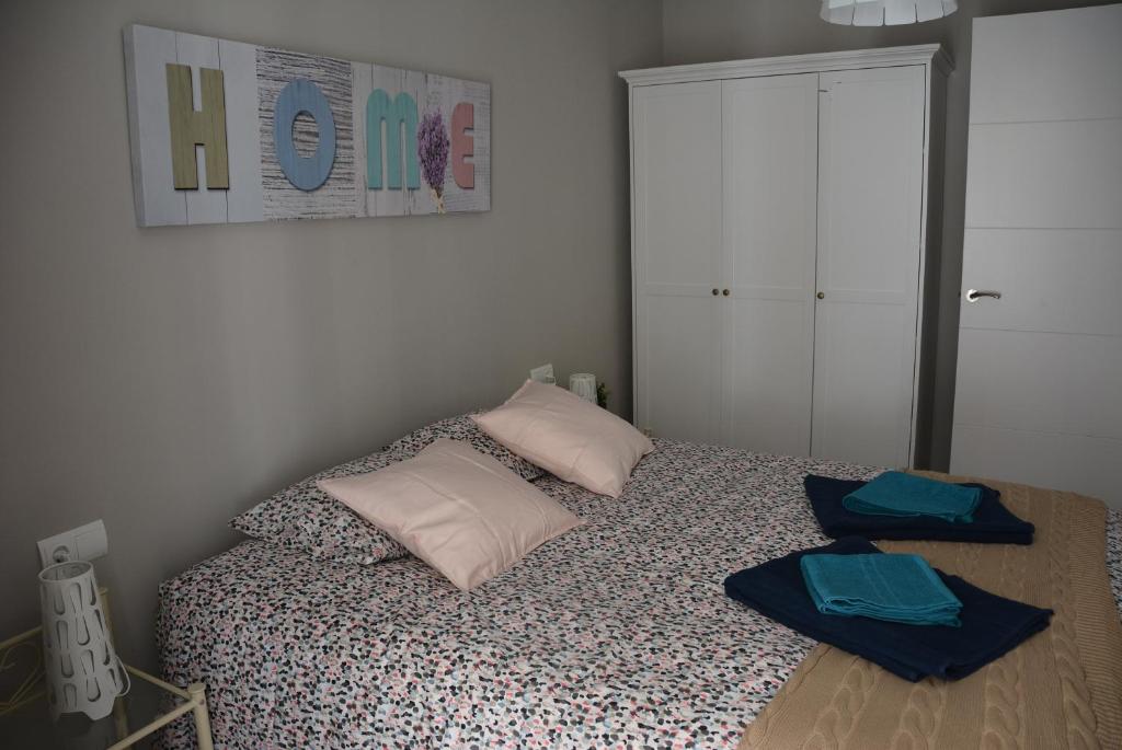 Posteľ alebo postele v izbe v ubytovaní Apartamento Flavia II Sant Damià