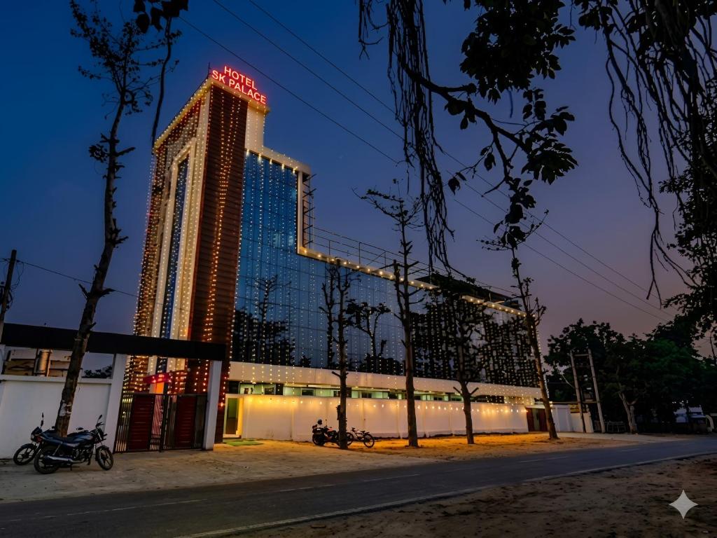 a tall building with lights on top of it at SK Palace in Rāe Bareli