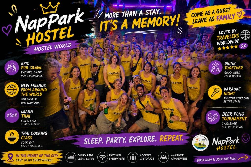 a group of people in yellow shirts posing for a picture at Nappark Hostel @Khao San in Bangkok