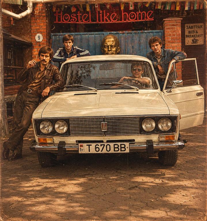 a group of men standing next to a car at Like Home Hostel & TOURS in Tiraspol