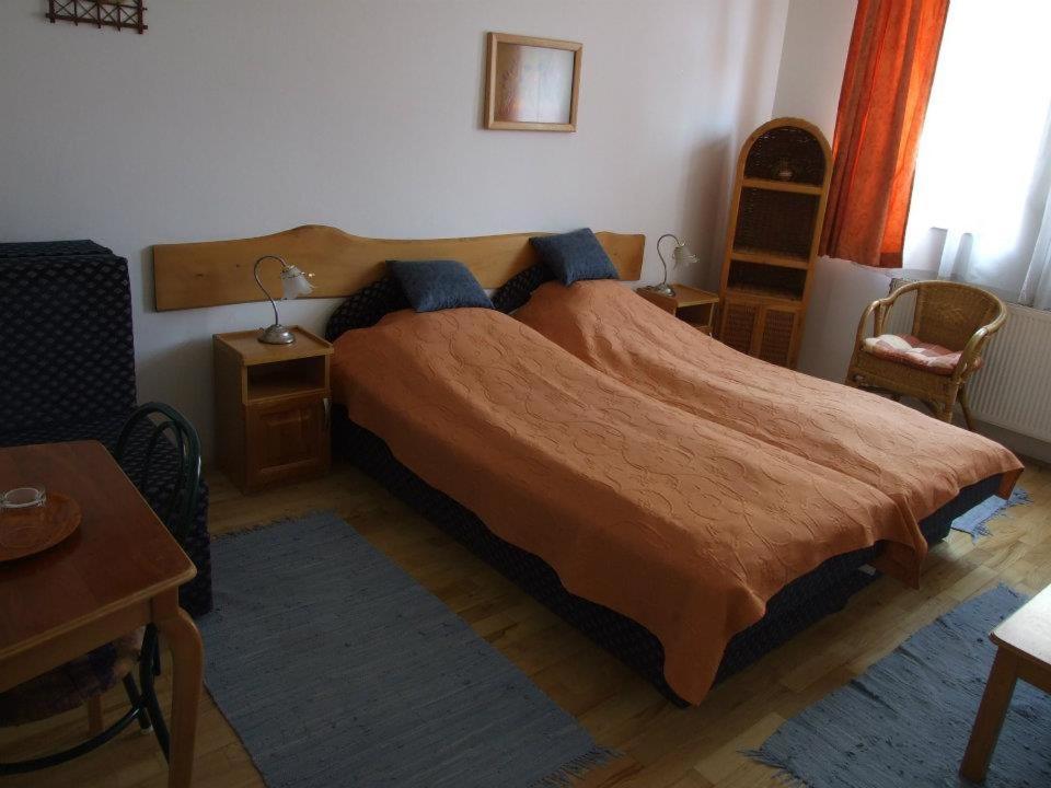 Postel nebo postele na pokoji v ubytování Hotel Diána