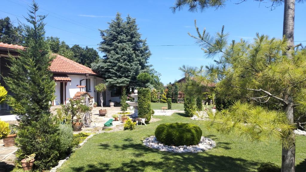 a garden in front of a house at Villa Toni in Varna City