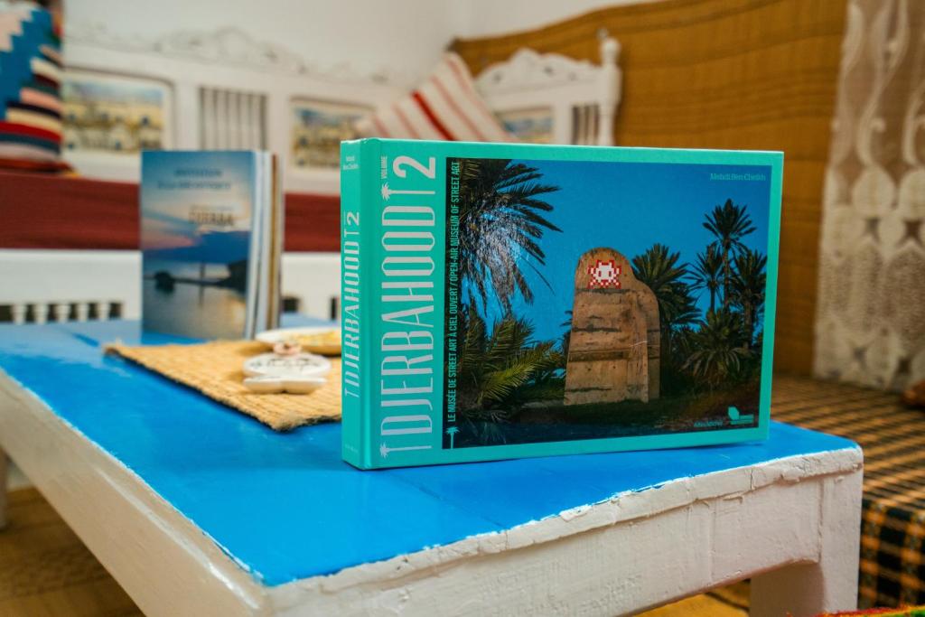 a book sitting on top of a table at Villa Bianca 2 in Fafou