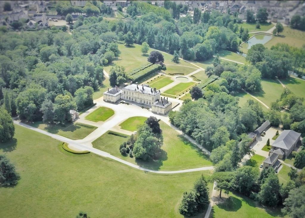 an aerial view of a large estate with trees at Château de Craon in Craon