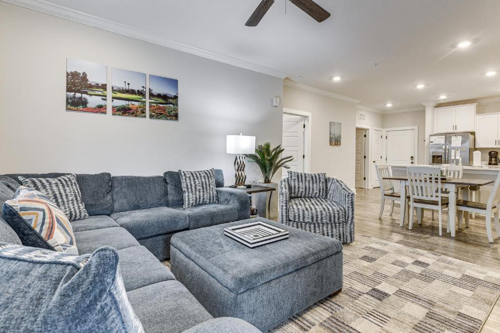 a living room with a couch and chairs and a table at Golf + Poolside Days! Condo 9 Mi to Sunset Beach in Calabash