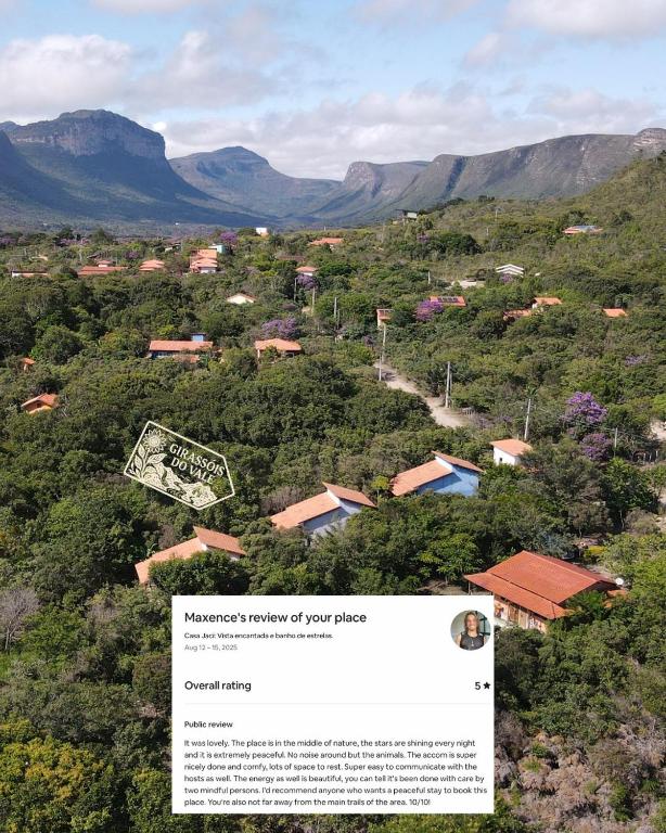 a map of a village with mountains in the background at Girassóis do Vale - Chalés no Vale do Capão in Caeté-Açu