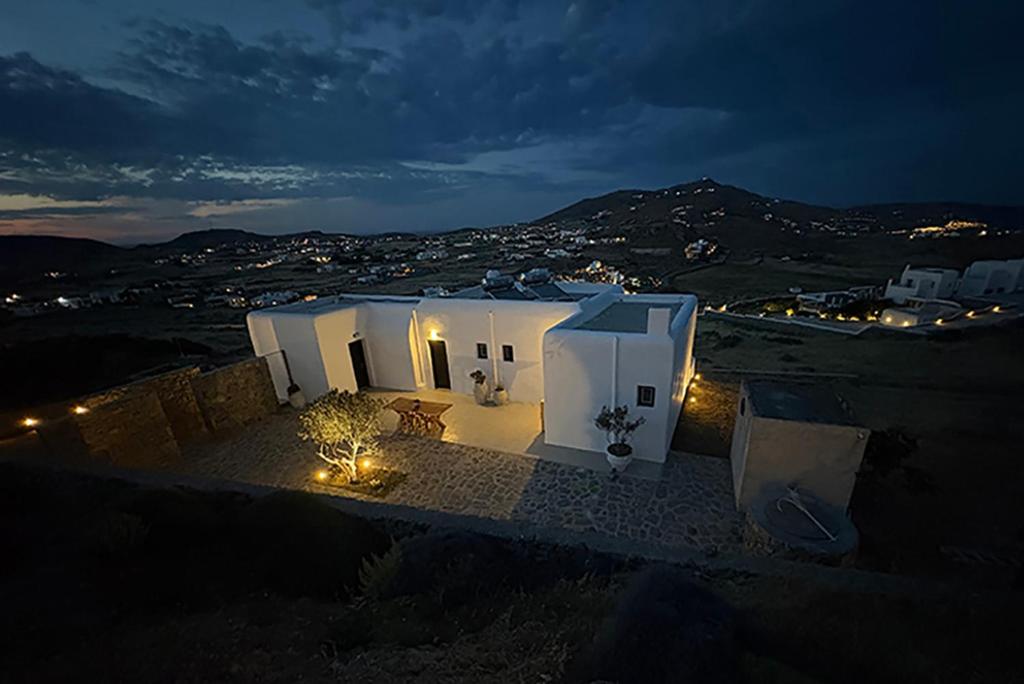 a group of white buildings at night at Maria's Private Space - Mykonos in Ano Mera