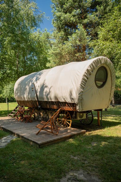 a large tent on display in a park at Várlak Glamping in Sub Cetate