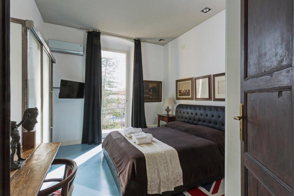 Postel nebo postele na pokoji v ubytování Loft Garibaldi