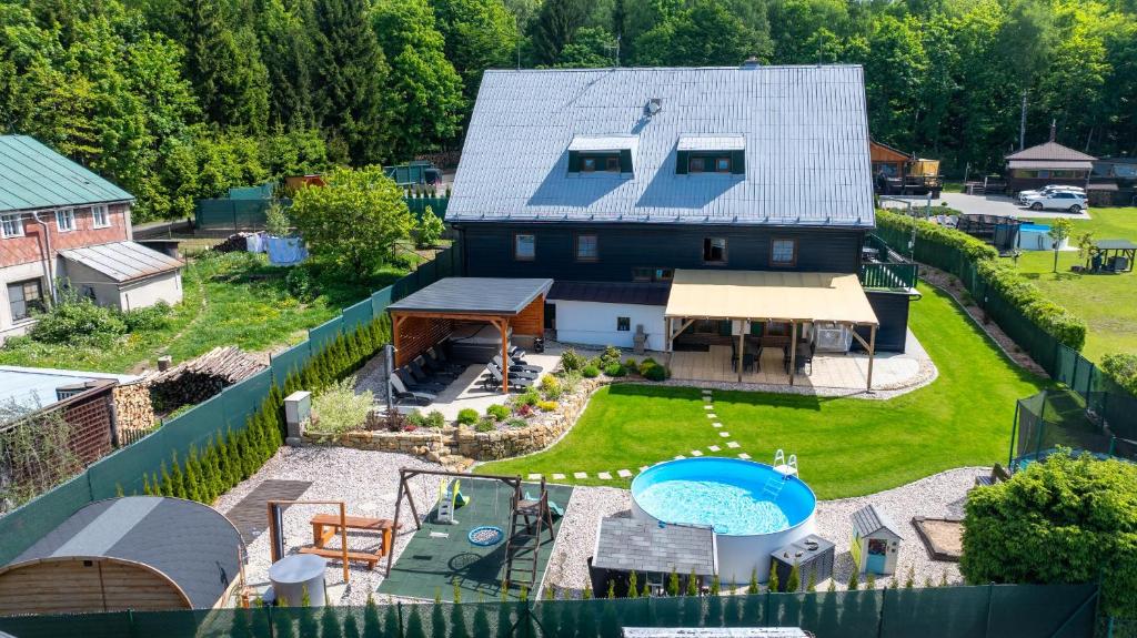 an aerial view of a house with a large backyard at Chata Markétka in Dobré