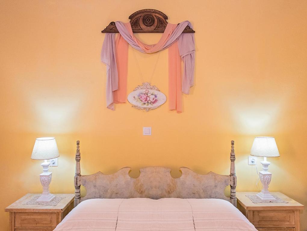 Postel nebo postele na pokoji v ubytování Villa Feakia