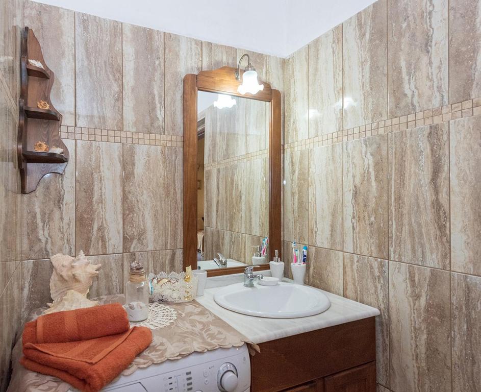 Koupelna v ubytování Villa Feakia