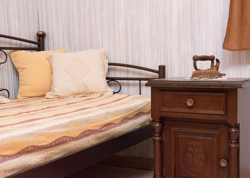 Postel nebo postele na pokoji v ubytování Villa Argo, Feakia
