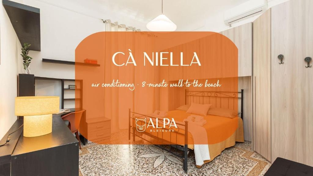 a room with a bed with a sign on it at "Cà Niella" in centro e a 9 m dal mare in Savona