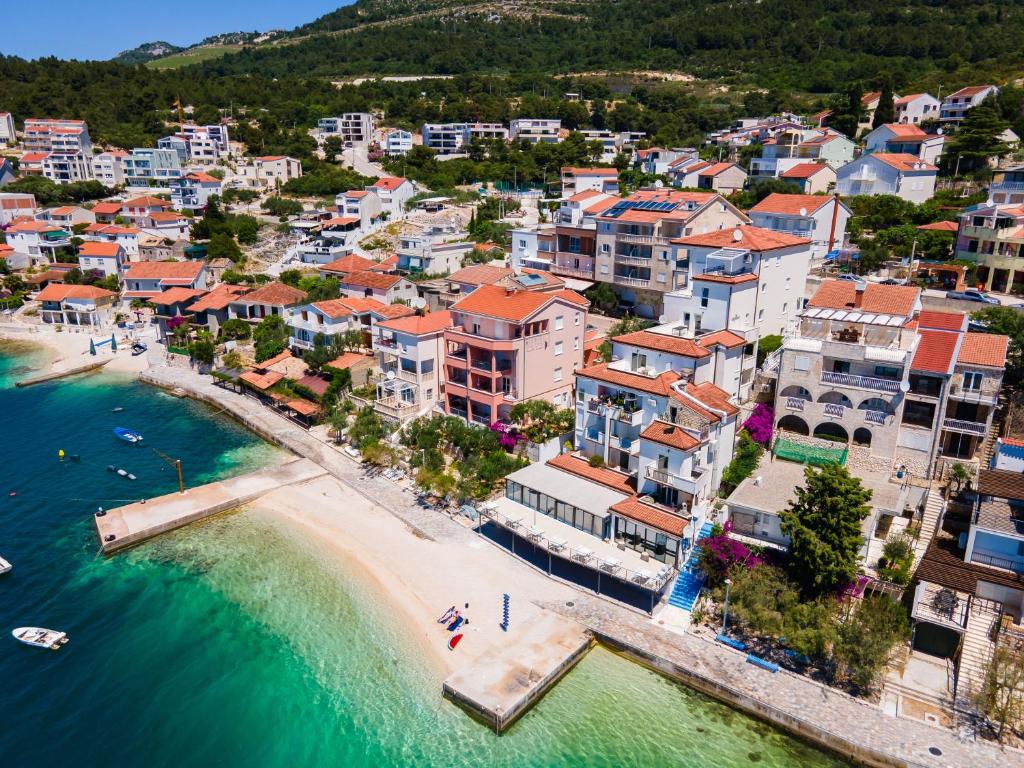 an aerial view of a town on the beach at Grand Holiday Residence in Komarna