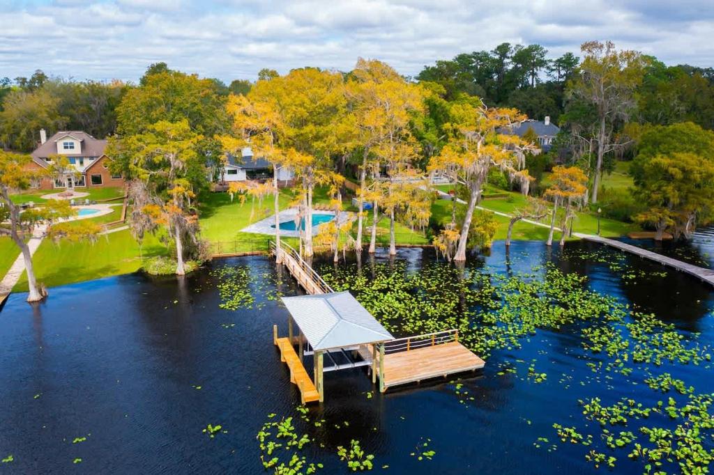 an aerial view of a dock on a lake at Waterfront Paradise Dock Pool Boathouse in Jacksonville