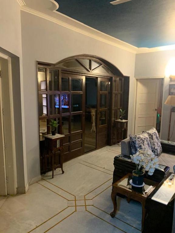 a living room with a couch and a table at The Langford in Bhaktapur