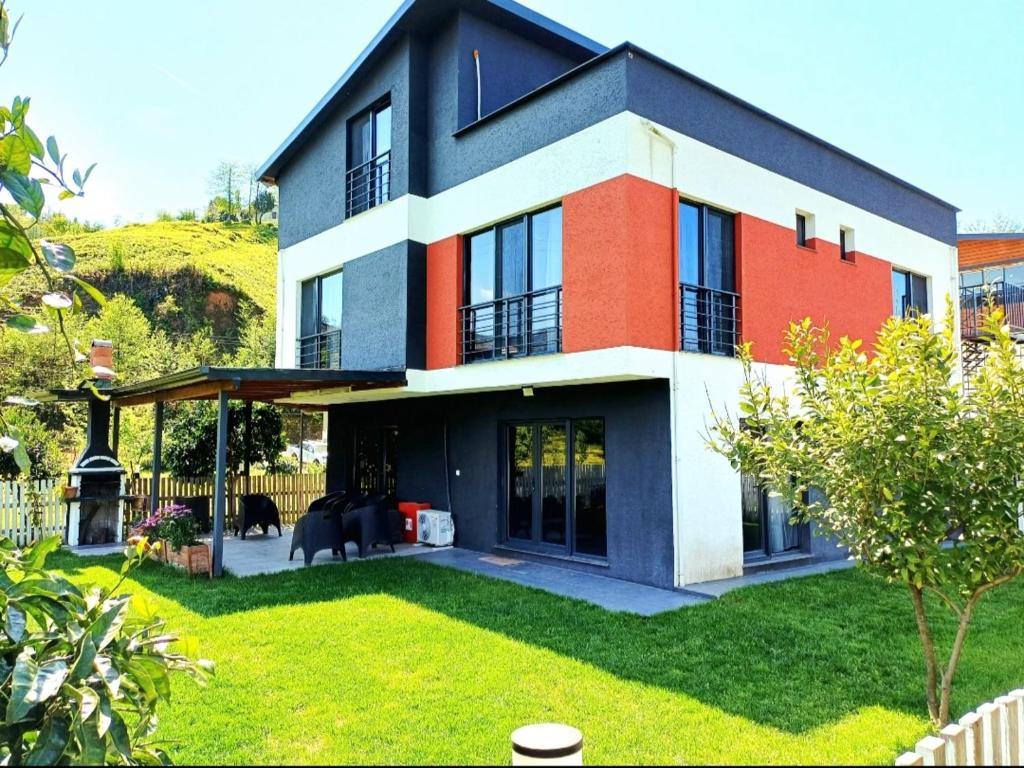 a large house with a lawn in front of it at VillaZ Villa Ardeşen in Ardeşen