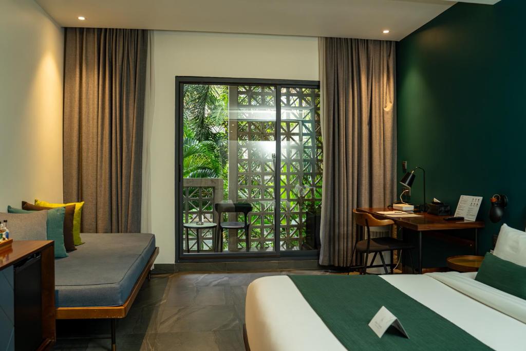 Baitong Hotel & Resort Phnom Penh - Vista Piscina Deluxe