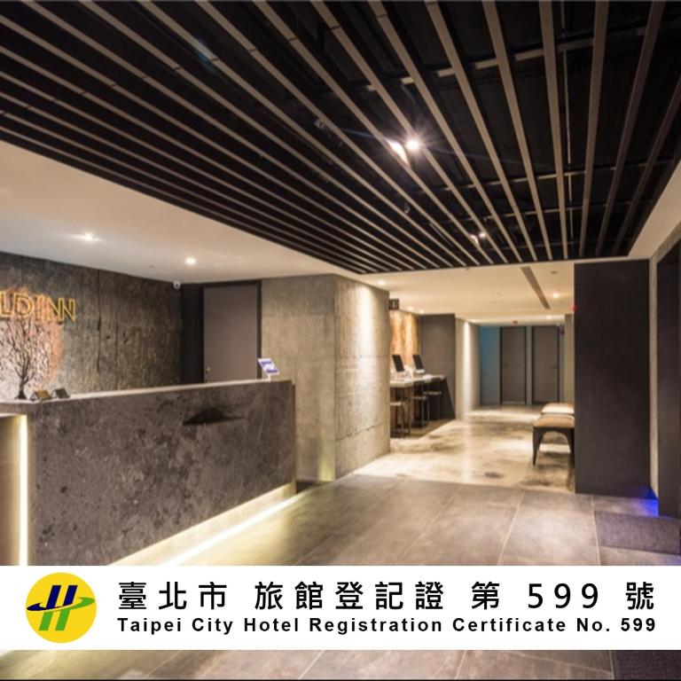 a lobby of a hotel lobby hotel hotel registration center at Goldinn Hotel in Taipei
