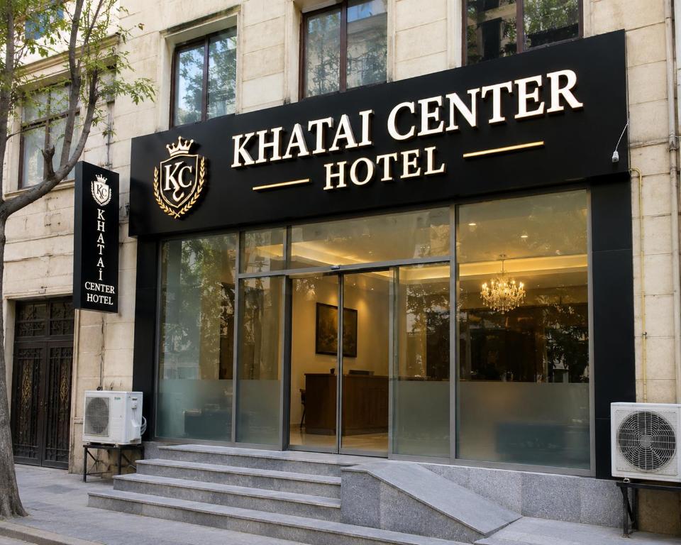 a khalili center hotel on the corner of a building at Khatai Center Hotel in Baku
